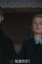 a man and woman standing together