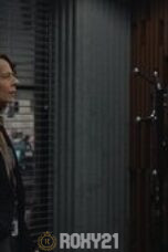 a woman looking at a man